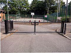 Black bow-top entrance gates