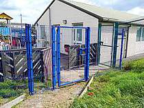 Blue powder coated mesh in-filled access gate