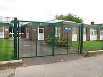 Double leaf green powder coated mesh in-filled entrance gates