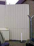 Fence constructed from coated steel sheet cladding