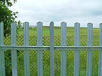 Galvanised rounded top D profile fence pales