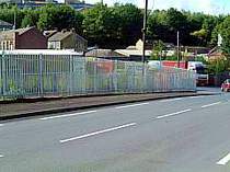 Galvanised steel palisade fencing with triple pointed tops