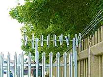 350mm galvanised rotating spikes fixed to the top of a palisade fence