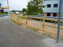 Triple rail wood fence
